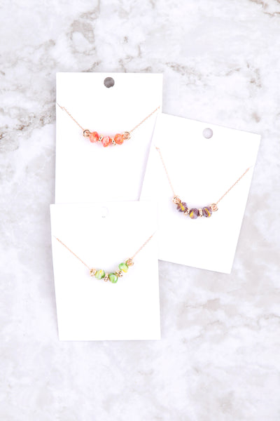 MULTI CRYSTAL CHARM NECKLACE W/ MARBLE