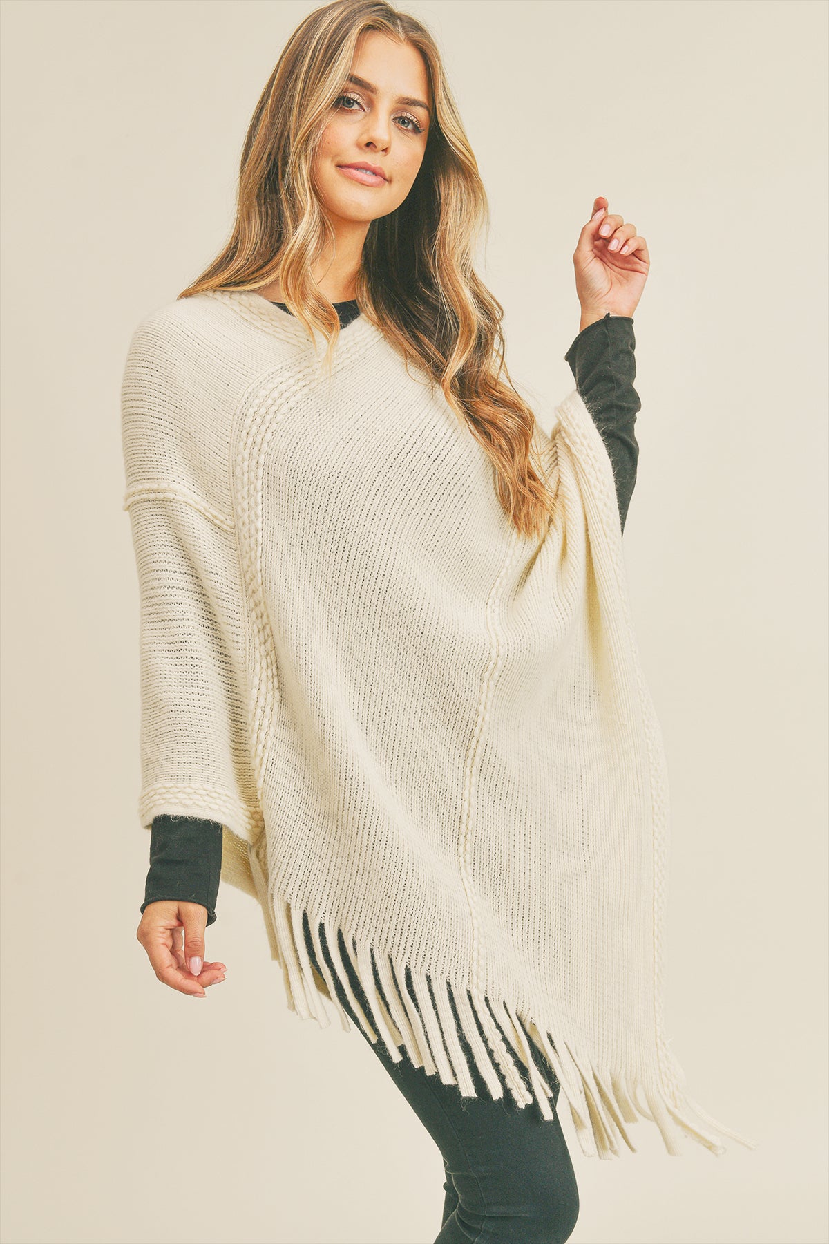 EMBOSSED DOTTED LINE TASSEL PONCHO