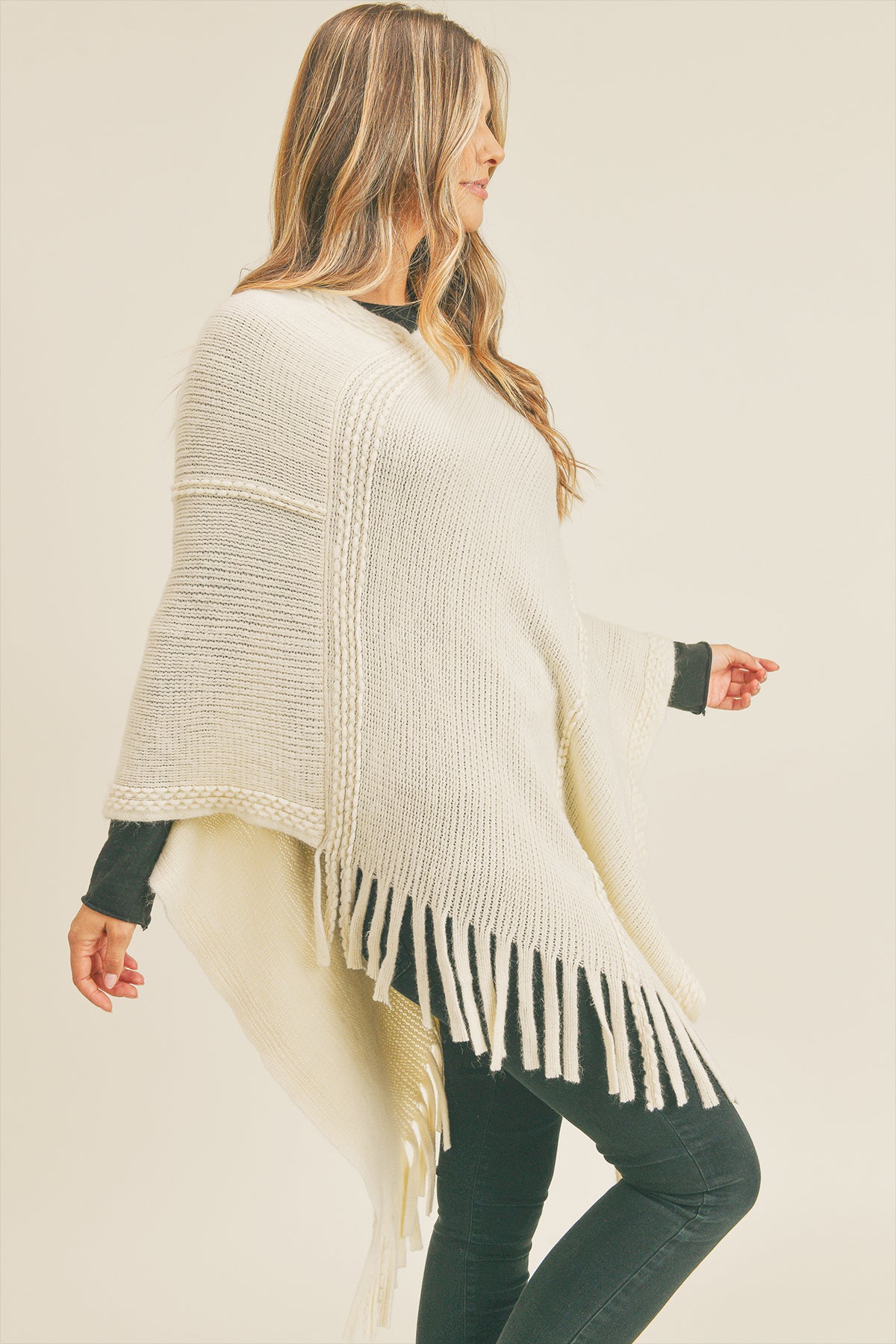 EMBOSSED DOTTED LINE TASSEL PONCHO