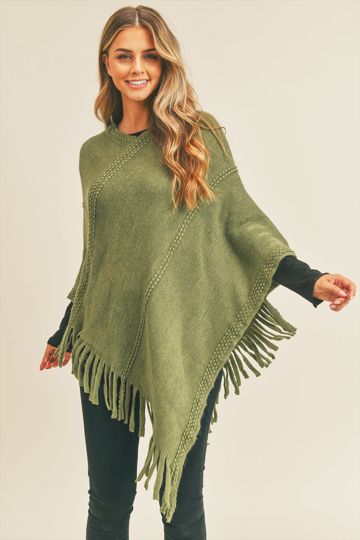 EMBOSSED DOTTED LINE TASSEL PONCHO