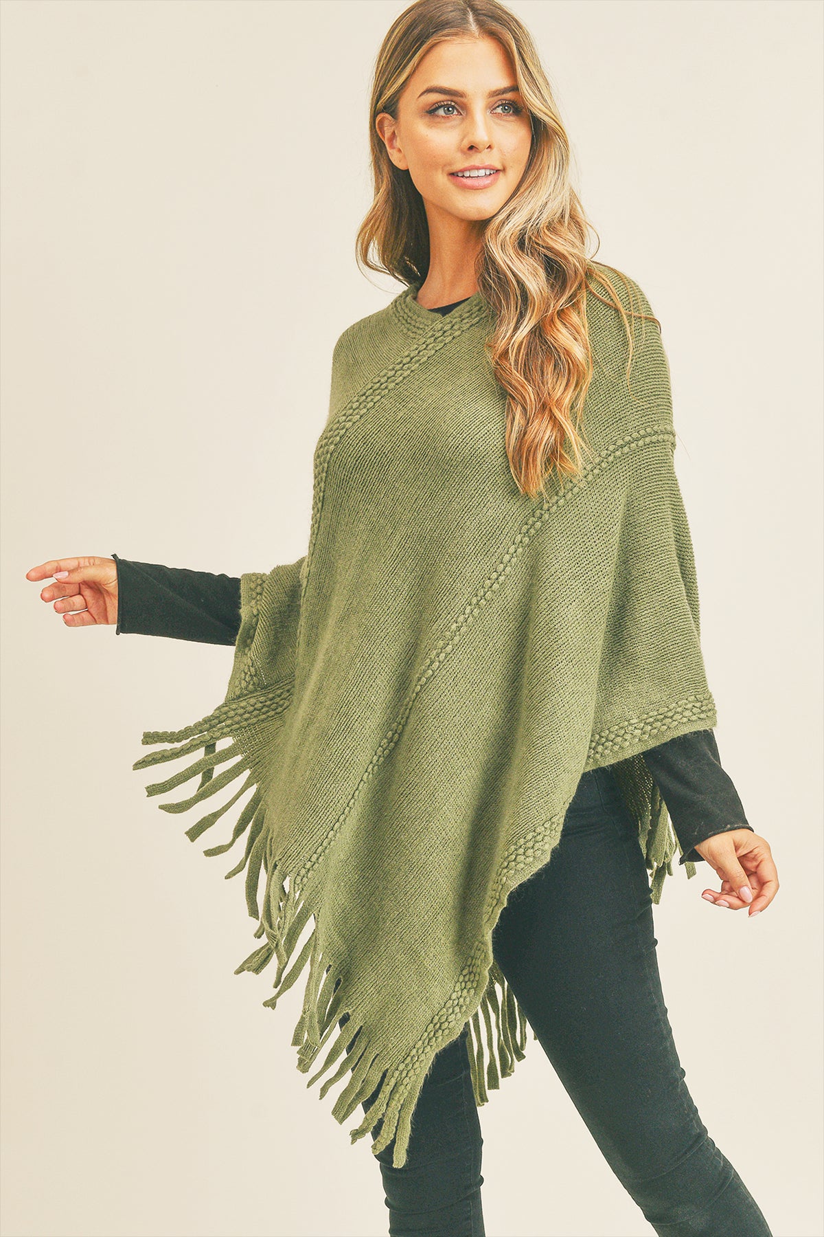 EMBOSSED DOTTED LINE TASSEL PONCHO