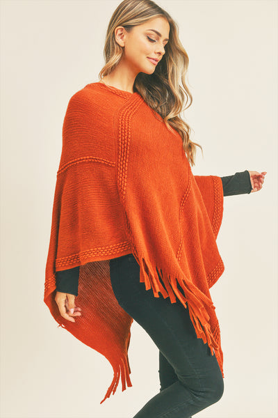 EMBOSSED DOTTED LINE TASSEL PONCHO