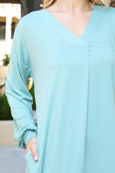 SOLID V-NECK LONG SLEEVE DOLPHIN HEM DRESS 1-2-2-1