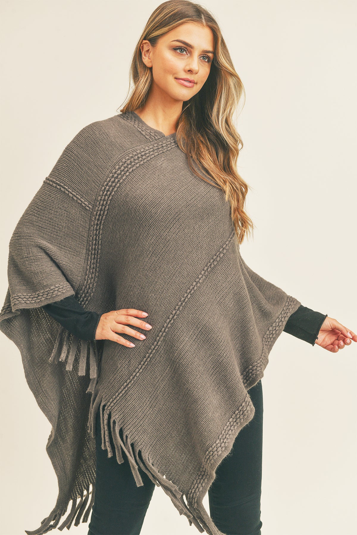 EMBOSSED DOTTED LINE TASSEL PONCHO