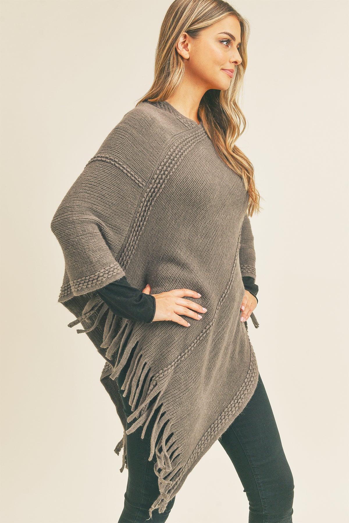 EMBOSSED DOTTED LINE TASSEL PONCHO